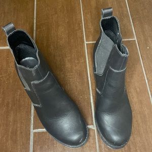 Black wedge booties.